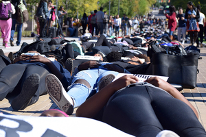 Protests and demonstrations, such as the die-in to protest police brutality pictured here, have rocked the SU campus over the past four years.